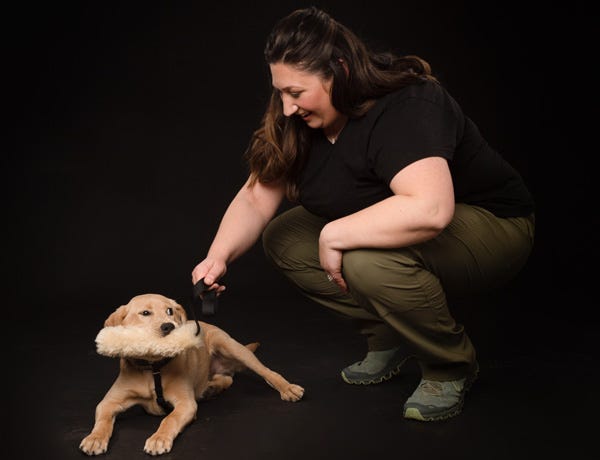 Lesley Shade training a dog.