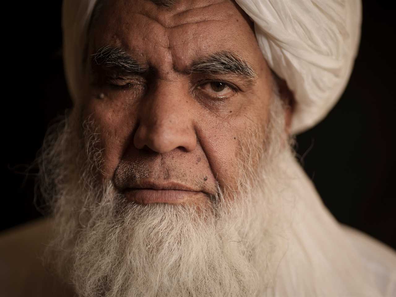 Taliban leader Mullah Nooruddin Turabi poses for a photo in Kabul, Afghanistan, Wednesday, Sept. 22, 2021. Mullah Turabi, one of the founders of the Taliban, says the hard-line movement will once again carry out punishments like executions and amputations of hands, though perhaps not in public.