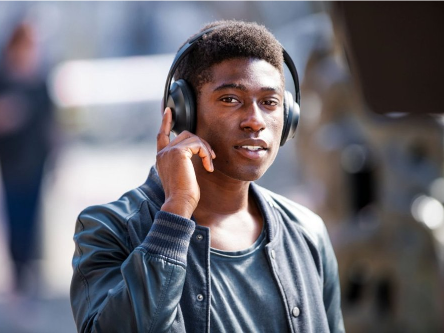 Bose 700 headphones in use